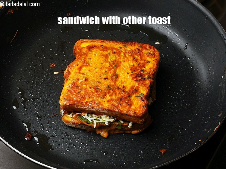 Step 25 – Sandwich with other tomato besan toast.