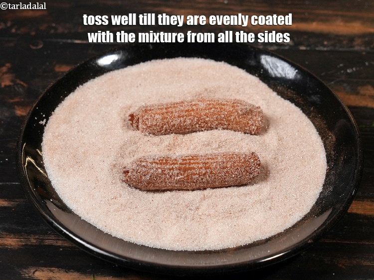 Step 25 – Toss well till they are evenly coated with the mixture from all the sides.