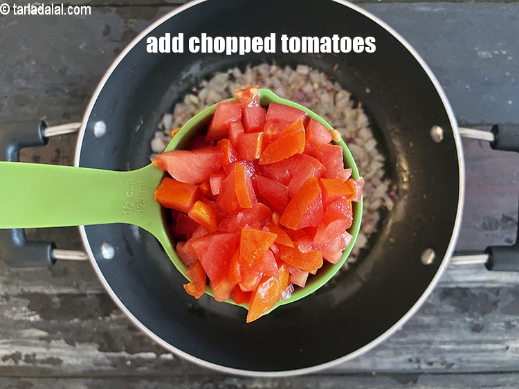 Step 24 – Add 1/2 cup chopped tomatoes.