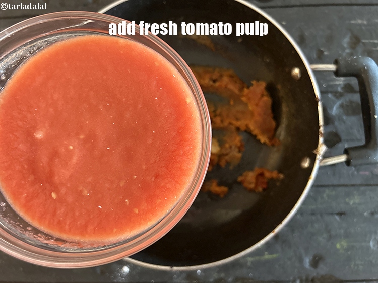 Step 37 – Add&nbsp;<meta charset="UTF-8" />1 cup&nbsp;fresh&nbsp;<a href="glossary-tomato-pulp-tamatar-ka-pulp-1039i">tomato pulp</a>.