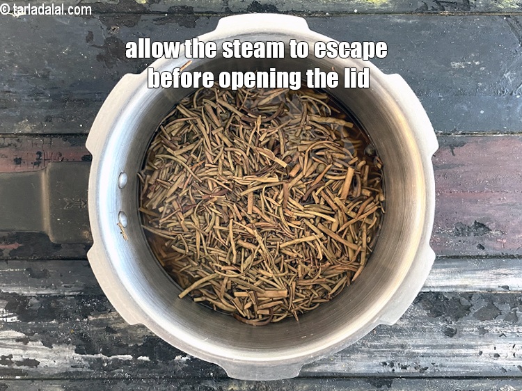 Step 27 – Allow the steam to escape before opening the lid.