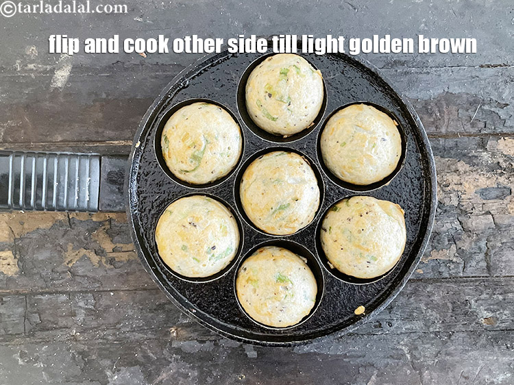 Step 27 – <meta charset="UTF-8" />Flip and cook till they turn golden brown in colour from the other …