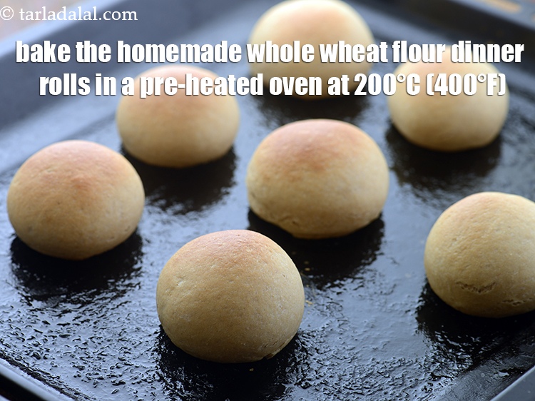 Step 23 – Bake the homemade whole wheat flour <strong>dinner rolls</strong> in a pre-heated oven at 200&deg;C (400&deg;F) …