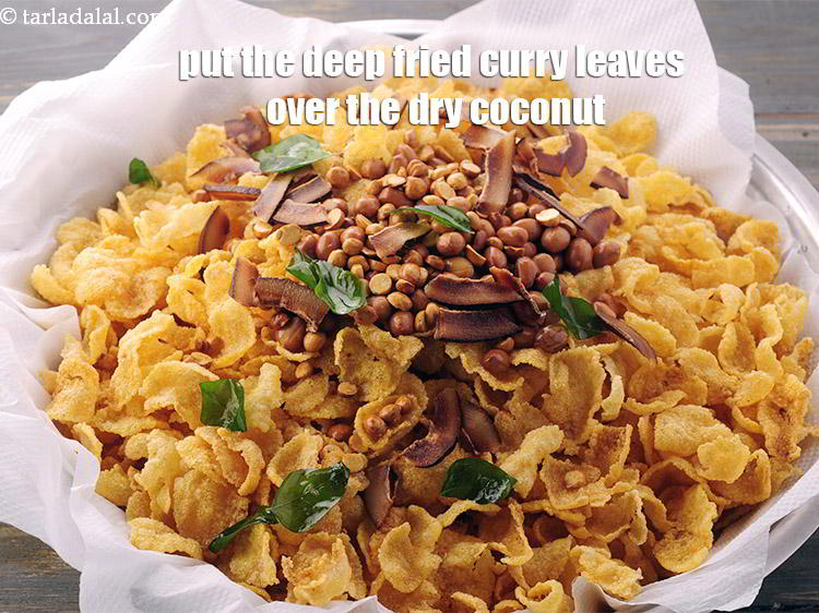 Step 26 – Drain well and place them over the deep-fried coconut.