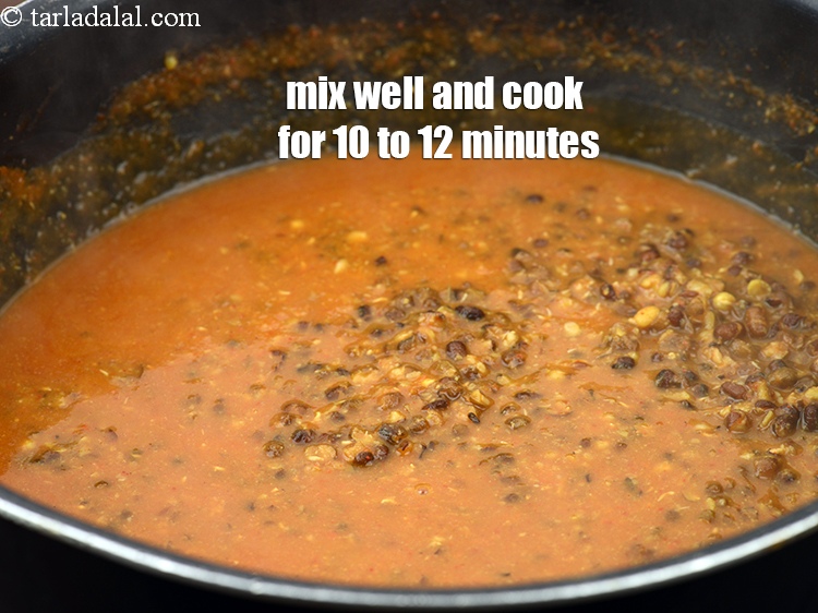 Step 24 – Mix well. Cover with a lid and cook the dal on medium flame for 10 …