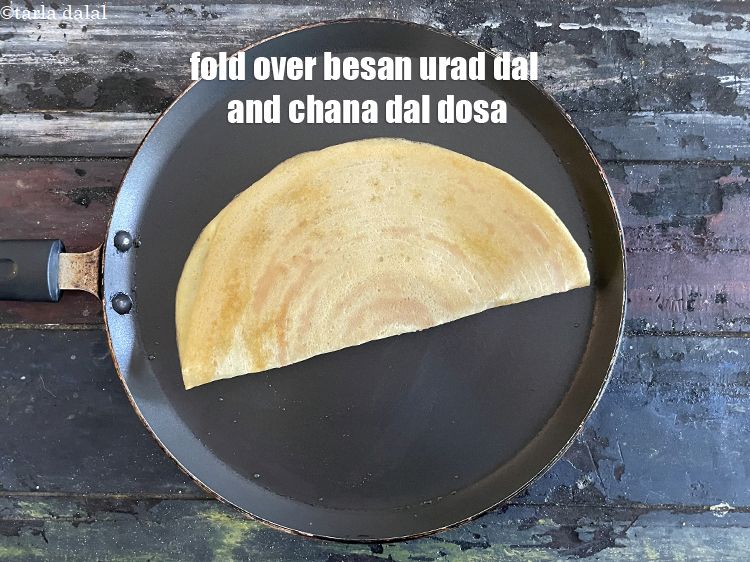 Step 29 – Fold over <strong>crispy cup dosa | besan, urad dal and chana dal dosa | healthy …