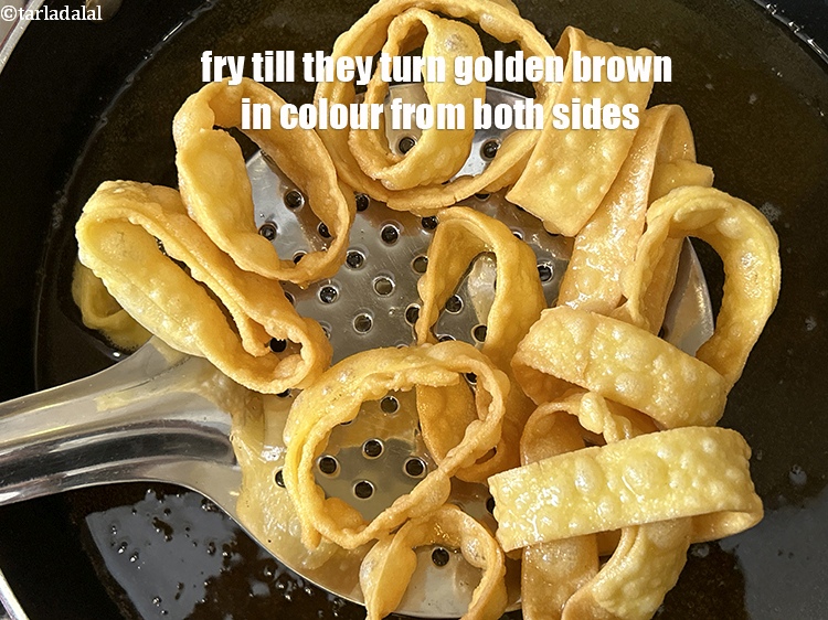 Step 24 – Fry till they turn golden brown in colour from both the sides.