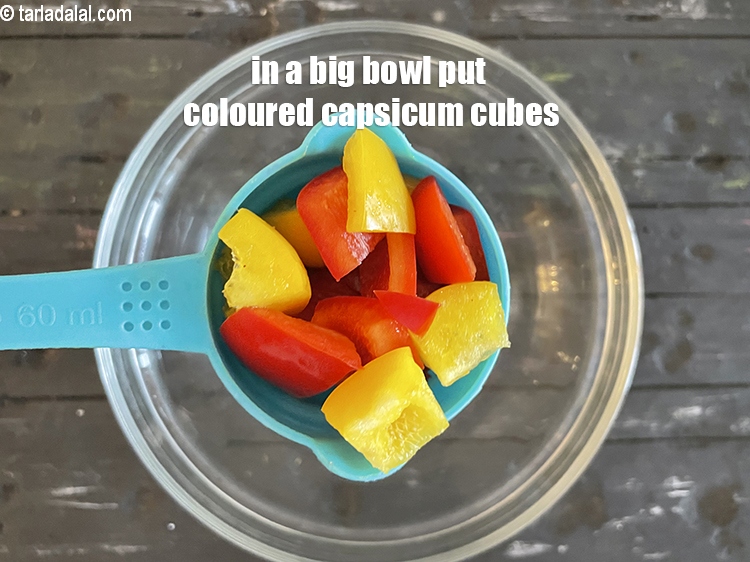 Step 25 – Add&nbsp;<meta charset="UTF-8" />1/2 cup&nbsp;<a href="glossary-red-capsicum-cubes-2077i">red capscium cubes</a>.