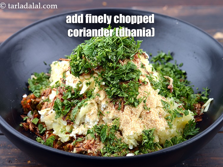 Step 24 – Add 2 tbsp&nbsp;finely&nbsp;<a href="https://www.tarladalal.com/glossary-chopped-coriander-783i">chopped coriander (dhania)</a>