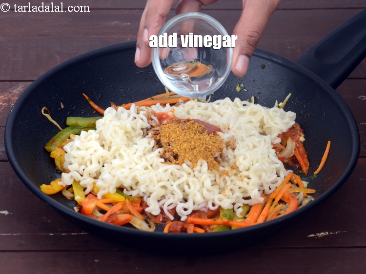 Step 24 – Add 2 tsp&nbsp;<a href="https://www.tarladalal.com/glossary-vinegar-sirka-cooking-vinegar-341i">vinegar</a>.&nbsp;