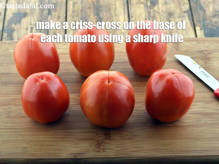 Step 24 – Make a criss-cross on the base of each tomato using a sharp knife. Make sure …