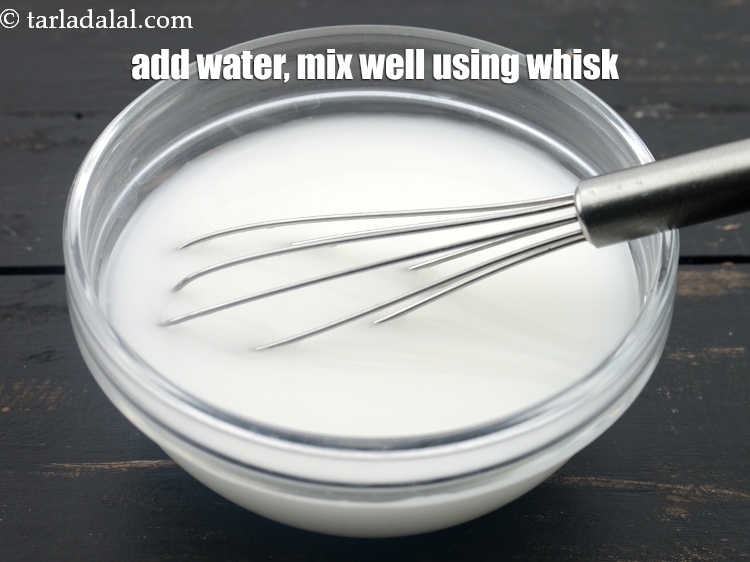 Step 25 – Add &frac12; cup water, mix well using a whisk.