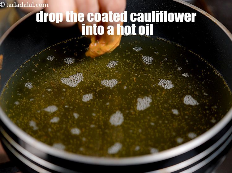 Step 23 – Drop the coated cauliflower into a hot oil.