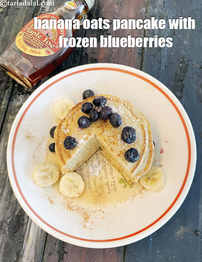 Step 30 – Top&nbsp;&nbsp;banana oats pancake with&nbsp;frozen blueberries.&nbsp;Serve&nbsp;banana oats pancake with blueberries hot.