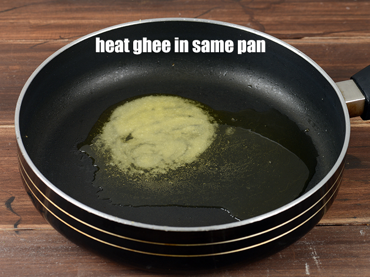 Step 24 – Heat &frac14; cup <a href="https://www.tarladalal.com/glossary-ghee-245i">ghee</a> in the same non- stick pan.