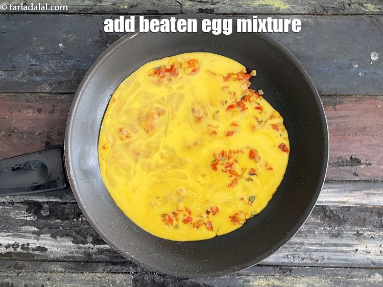 Step 25 – Add&nbsp;<meta charset="UTF-8" />beaten egg mixture.