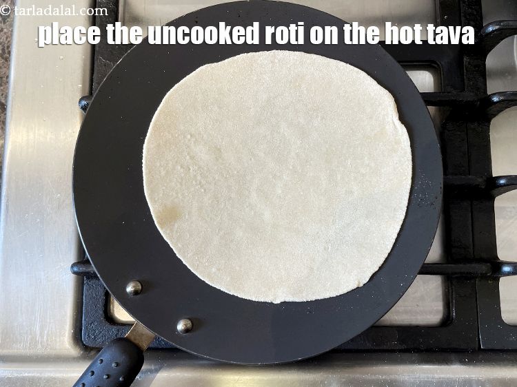 Step 17 – Heat a non-stick tava (griddle) on a high flame and when hot, lower the flame …