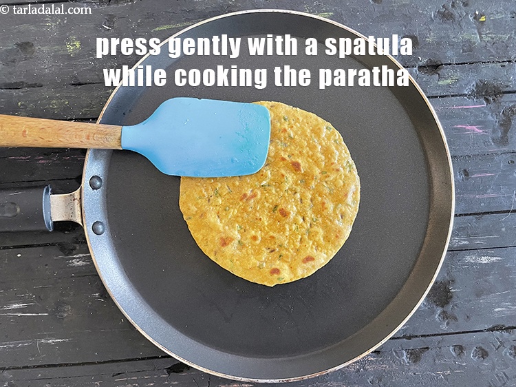 Step 24 – Press it gently using a spatula while roasting.&nbsp;
