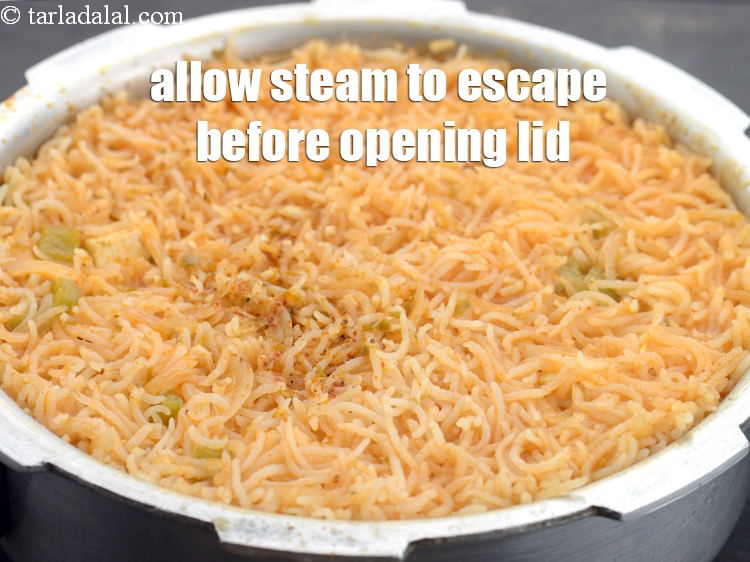 Step 27 – Allow the steam to escape before opening the lid.