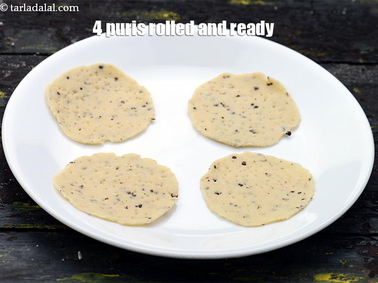 Step 26 – Meanwhile roll 3 more such puris. These are all 4 puris rolled and ready.