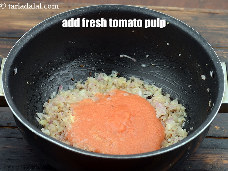Step 25 – Add 1 cup&nbsp;fresh&nbsp;<a href="https://www.tarladalal.com/glossary-tomato-pulp-tamatar-ka-pulp-1039i">tomato pulp</a>.