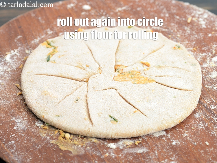 Step 25 – Roll out again into a circle of 125 mm. (5&quot;) in diameter, using whole wheat …