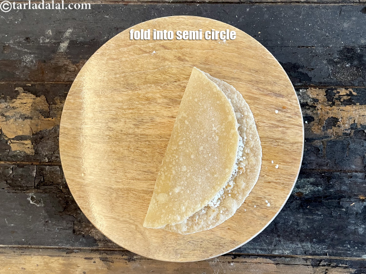 Step 25 – Fold it over to make a semi-circle.