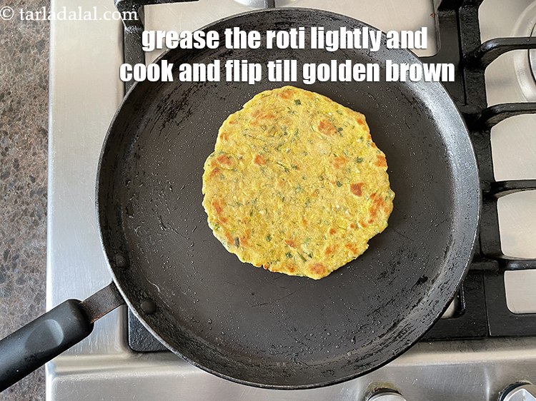 Step 27 – Grease the roti lightly again and flip and cook till golden brown.