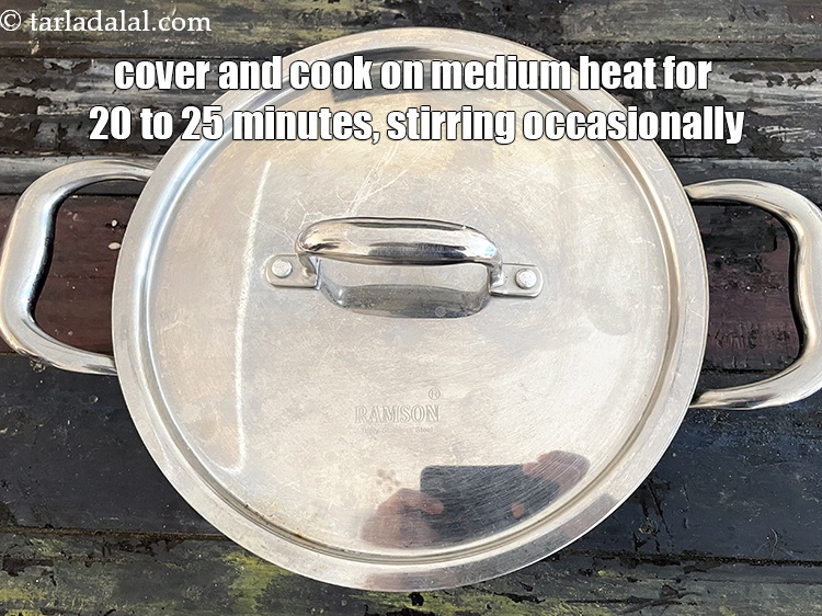 Step 32 – <strong>Cover and cook on a medium flame for 20 to 25&nbsp;minutes</strong>, while stirring occasionally.