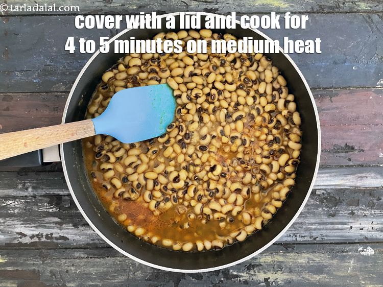 Step 26 – <p>Cover with a lid and cook on a medium flame for 4 to 5 minutes, …