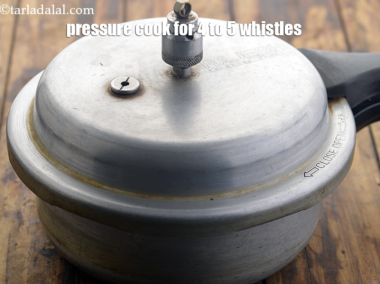 Step 8 – Close the lid and pressure cook the rajmas for 4-5 whistles or on a medium …