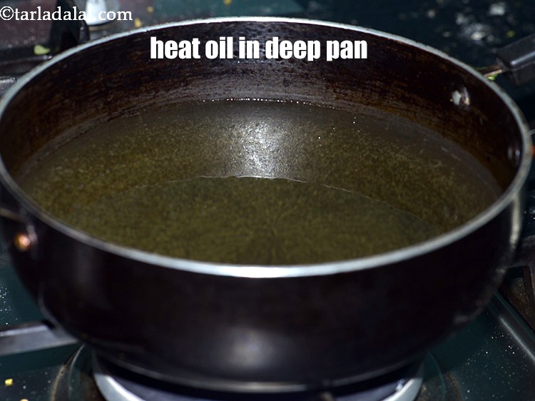 Step 24 – Heat the oil in a deep non-stick pan.
