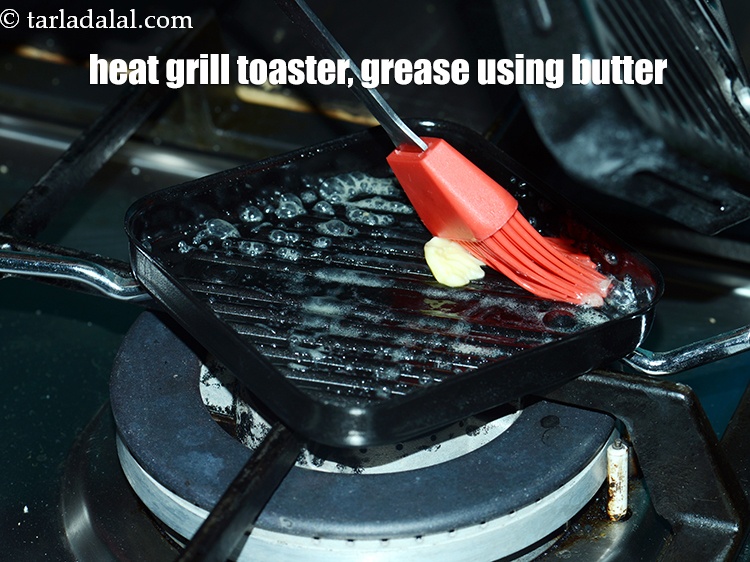 Step 23 – Heat a grill toaster, grease the grill toaster using 1 tbsp butter.