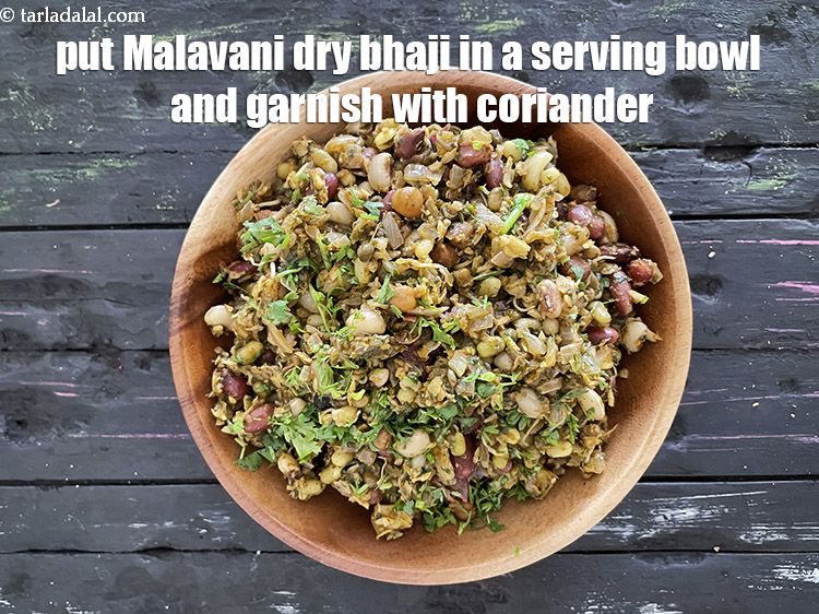 Step 26 – Put <meta charset="UTF-8" /><strong>malvani dry bhaji&nbsp;</strong>&nbsp;in a serving bowl and garnish with coriander.