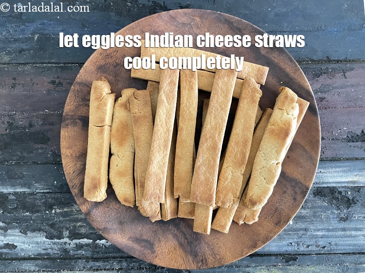 Step 26 – <meta charset="UTF-8" /> Put&nbsp;<strong>eggless Indian cheese sticks</strong>&nbsp;in a serving bowl and let them cool.