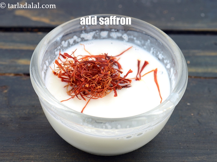 Step 24 – Add 1/2 tsp&nbsp;<a href="https://www.tarladalal.com/glossary-saffron-kesar-520i">saffron (kesar) strands</a>.