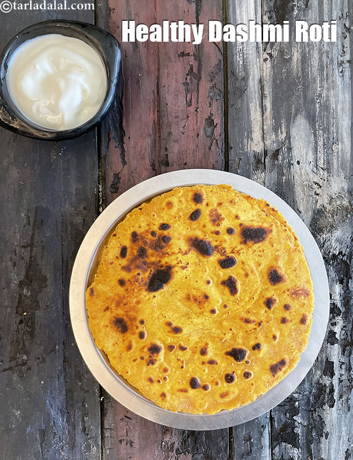 Step 30 – Serve <strong>dashmi roti |&nbsp;Maharashtrian savoury dashmi roti |</strong>&nbsp;<strong>healthy Maharashtrain dashmi roti |&nbsp;</strong>with curd,&nbsp;&nbsp;<a href="https://www.tarladalal.com/garlic-chutney-red-garlic-chutney-wet-lasun-indian-chutney-2865r">garlic chutney</a>.