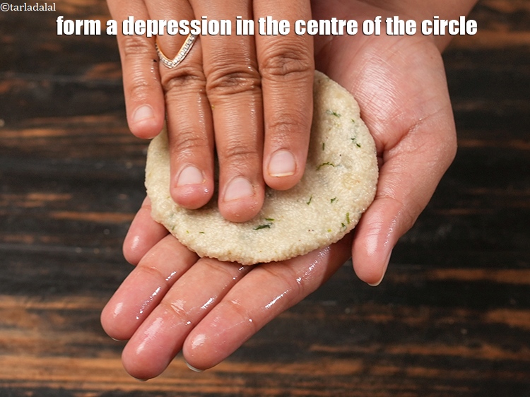 Step 26 – Form a depression in the centre of the circle.