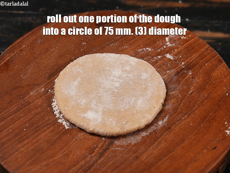 Step 26 – Roll out one portion of the dough into a circle of 75 mm. (3") diameter.