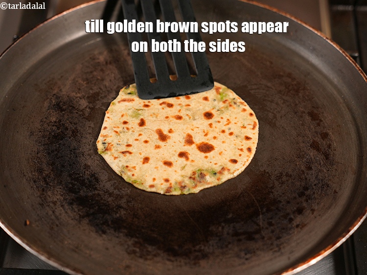 Step 26 – Till golden brown spots appear on both the sides.