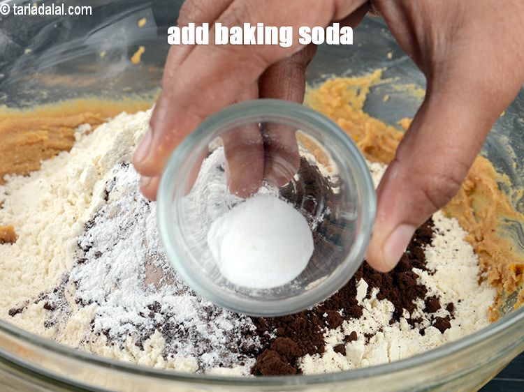 Step 25 – Add &frac12; tsp <a href="https://www.tarladalal.com/glossary-baking-soda-soda-bi-carb-615i">baking soda</a>.