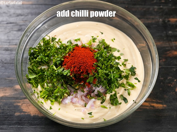 Step 25 – Add &frac12; tsp <a href="https://www.tarladalal.com/glossary-chilli-powder-red-chilli-powder-339i">chilli powder</a>.