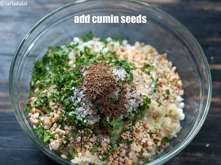 Step 25 – Add 1 tsp <a href="https://www.tarladalal.com/glossary-roasted-and-crushed-cumin-seeds-2206i">crushed cumin seeds (jeera)</a>.