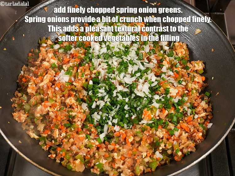 Step 25 – Add &frac12; cup finely chopped spring onion greens. Spring onions provide a bit of crunch …