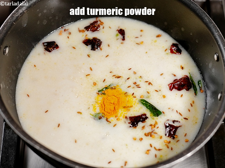 Step 25 – Add &frac14; tsp <a href="https://www.tarladalal.com/glossary-turmeric-powder-haldi-645i">turmeric powder (haldi)</a>.