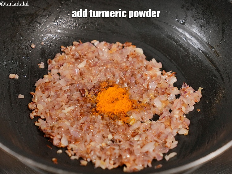 Step 25 – Add &frac14; tsp <a href="https://www.tarladalal.com/glossary-turmeric-powder-haldi-645i">turmeric powder (haldi)</a>.&nbsp;
