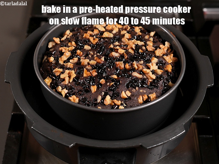 Step 25 – Bake in a pre-heated pressure cooker on slow flame for 40 to 45 minutes.