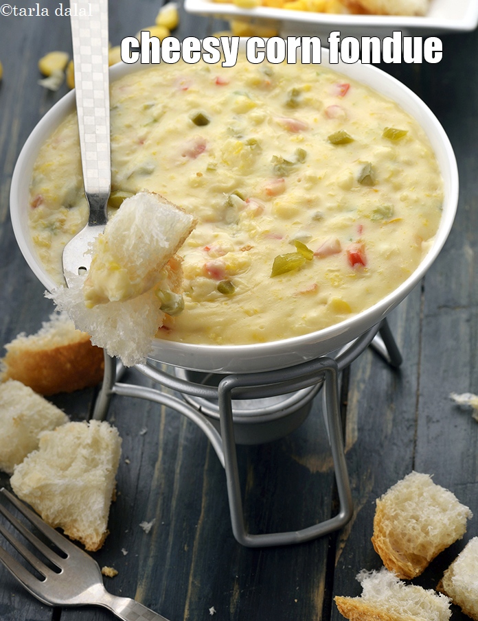 Step 25 – Serve <strong>corn jalapeno fondue</strong> immediately with herb bread and brun pav pieces.