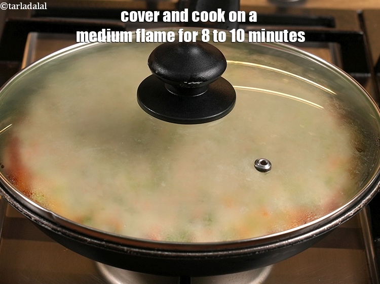 Step 25 – Cover and cook on a medium flame for 8 to 10 minutes.