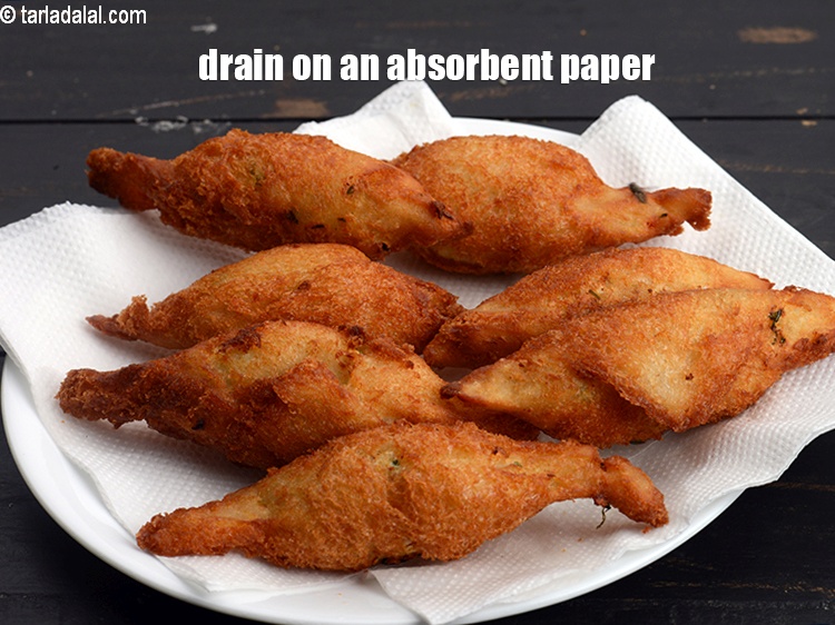 Step 25 – Deep fry them in hot oil on medium flame till golden brown and crisp. Drain …